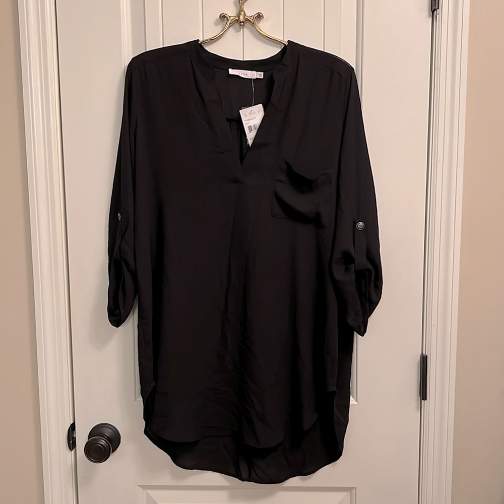 Tunic length top with ruched sleeves